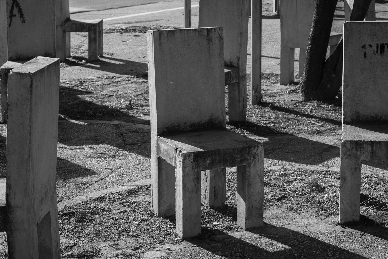 Abstract concrete chairs in Córdoba, Argentina create a striking urban scene.